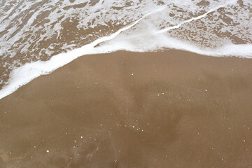Mediterranean Sea. Beautiful clean sand and sea foam.