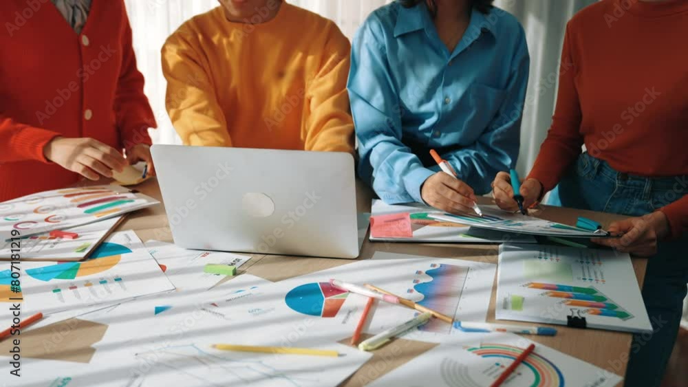 Poster startup company employee working together using laptop analyzing bi dashboard paper on financial dat