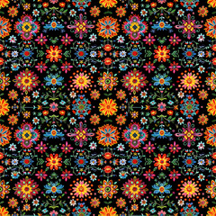 Seamless vibrant Mexican embroidery pattern on black background. Colorful floral designs showcase traditional Hispanic folk art suitable for fabric and decor