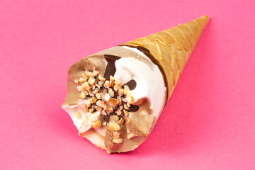 Chocolate and vanilla ice cream in a waffle cone