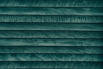 Background made of green wooden lines stripes surface with copy space.Empty blank backdrop with old-fashioned scratches.