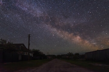 starry night sky over the house