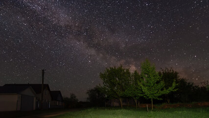 starry night sky in the village