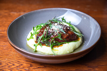 the mashed potatoes with cutlet and herbs