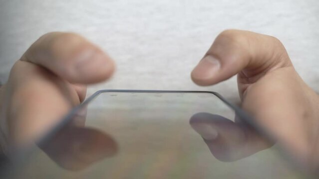 Smartphone addiction concept. Hands scrolling through social network app