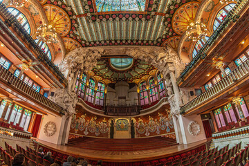 Concert hall of Palace of Catalan Music, concert hall designed in the Catalan modernista style,...