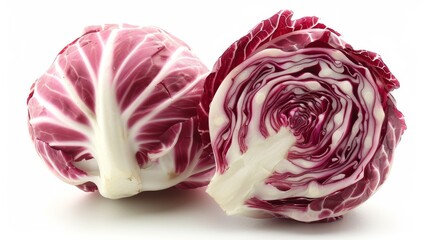 A photo of a red cabbage on a white background, with one half of the cabbage cut away to show the inside.