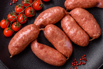 Baked chicken or pork sausages, salt, spices and herbs