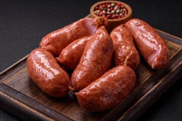 Baked chicken or pork sausages, salt, spices and herbs