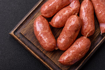 Baked chicken or pork sausages, salt, spices and herbs