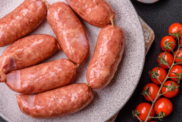 Baked chicken or pork sausages, salt, spices and herbs