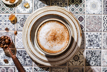 cappuccino on the tile table