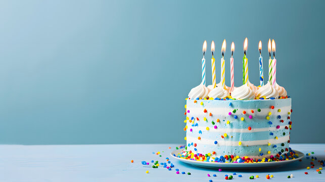 birthday cake with candles on a blue background