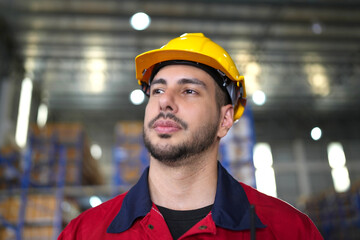 Warehouse worker working in warehouse storage. Foreman or worker work at factory site check up...