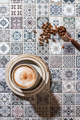cappuccino on the tile table
