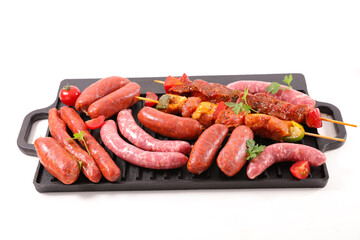 barbecue grill with meats- beef skewer, sausage
