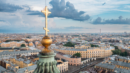 view of the historical center of St. Petersburg through the cross of the Kazan Cathedral