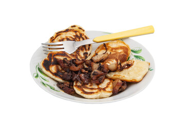 A delicious country breakfast, fried pancakes and meat and onions in a plate with a fork with no background.