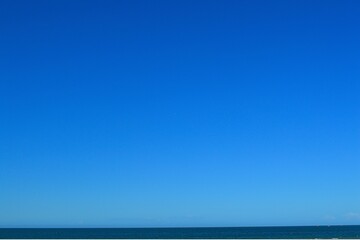 Panoramic view of the blue sky and sea waves
