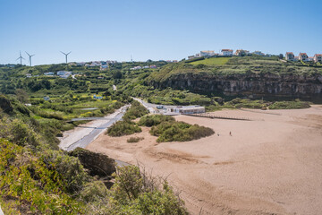 Sandy beach of São Lourenço with Safarujo river between mountains with vegetation, Ericeira - Mafra PORTUGAL