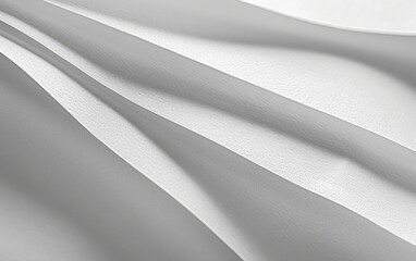 Close-up of a smooth white paper texture.