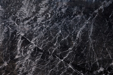 Fototapeta premium Close up of black marbling texture. High resolution photo.Nice background for design projects. Grigio Carnico marble