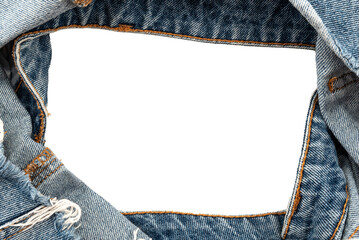 Hole in denim on a white background. Ripped jeans