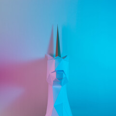 White paper unicorn head in vibrant bold gradient holographic colors. Minimal art fantasy concept.
