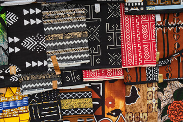 Mixture of traditional African Ghanaian black white and red based multi pattern wax block cotton...