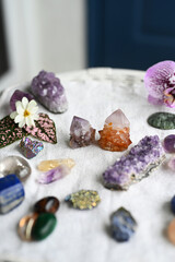 A beautiful assortment of healing crystals and flowers. Fresh and vibrant, moody crystals. Amethyst, citrine, quartz, and rare crystals. 