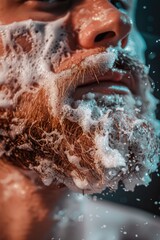 Fototapeta premium close-up of a man shaving his beard