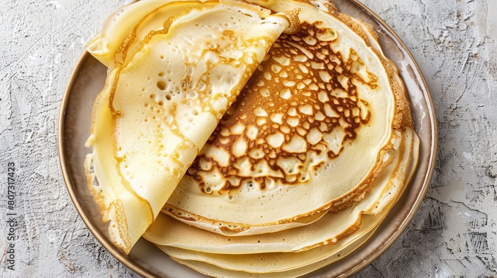 Poster top view of rolled pancakes on light background with ample text space, ideal for presentations