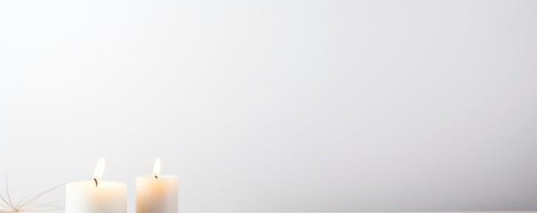 White background with white thin wax candle with a small lit flame for funeral grief death dead sad emotion with copy space texture for display  - obrazy, fototapety, plakaty
