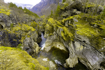 Sjurhaugfossen, A mountain range with a river running through it