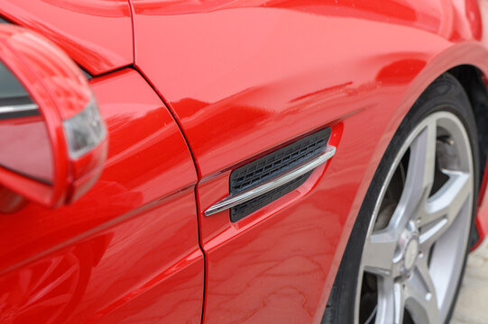 Gaziveren Cyprus 04.29.2024 red Mercedes SLK 250 front view 7