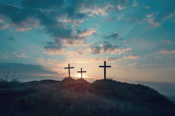 Two crosses on top of a hill at sunset. Suitable for religious and spiritual concepts