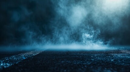 An abstract night background with smoke on the asphalt floor under soft blue light. Dark scene of an empty space for product presentation.