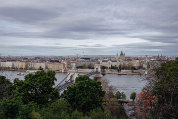 Danube river crossing Budapest city and the Szechenyi Chain Bridge famous landmark in Hungary