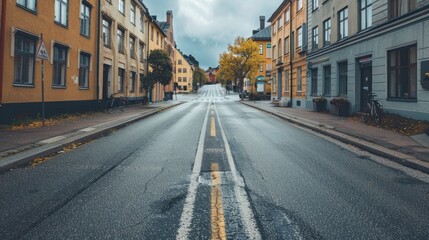 Empty asphalt street with separated bike lane in Sweden