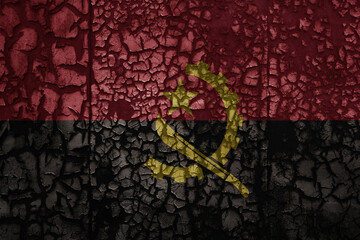 flag of angola on a old grunge metal rusty cracked wall background