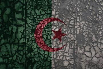 flag of algeria on a old grunge metal rusty cracked wall background