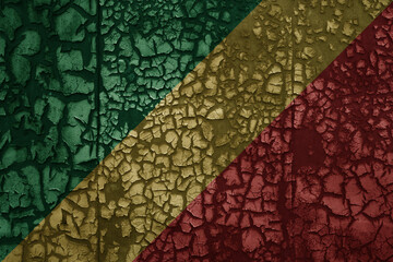 flag of republic of the congo on a old grunge metal rusty cracked wall background