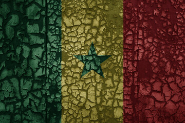 flag of senegal on a old grunge metal rusty cracked wall background
