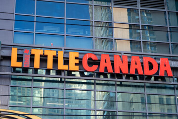 Obraz premium Little Canada logo sign. Little Canada is a tourist attraction located in the basement of The Tenor, near Yonge-Dundas Square. Toronto, Canada - April 30, 2024.