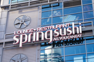 Obraz premium Spring Sushi Toronto restaurant logo sign. Toronto, Canada - April 30, 2024.