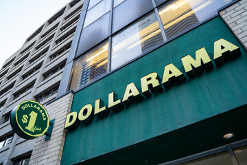 Obraz premium Dollarama logo sign. Dollarama Inc. is a Canadian dollar store retail chain. Toronto, Canada - April 30, 2024.