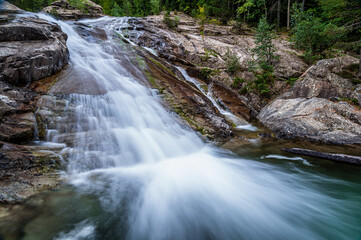 Fototapeta premium Beautiful waterfall in the high mountains