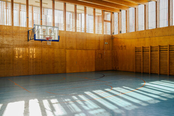 A basketball court with no people and with a hoot