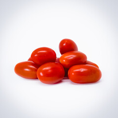 Pile of fresh ripe baby plum tomatoes