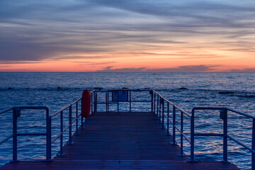 Fototapeta premium Sunset in Cyprus. View of Paphos coast at sunset. Evening landscape of Cyprus.
